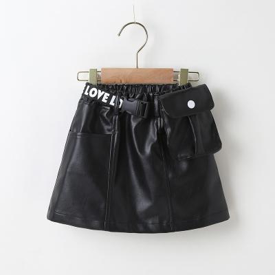 China Anti-wrinkle new fashion leather skirt for kids girls pu skirt with black red brown short skirts one line mini belt purse for sale