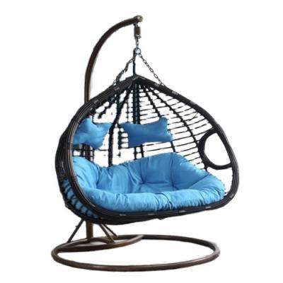 China Comfortable/sturdy direct sales comfortable 2 person leisure rattan patio egg swing hanging chair with stand for sale