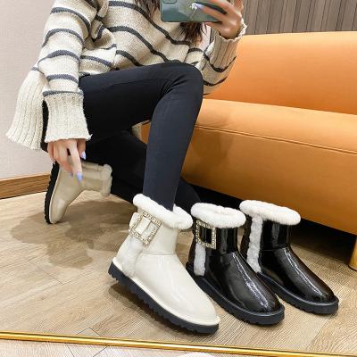 China 2021 Fashion Trend New Sheepskin Buckle Short Boots Women Snow Warm Hairy Square Platform Faux Stone Women Boots for sale