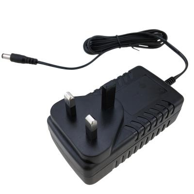 China ABS+PC Standard BS1363 Plug 24w 12v 2a DC Switch Power Adapter 12v 2a British Universal Flame Retardant Inverter For Massage Chair for sale