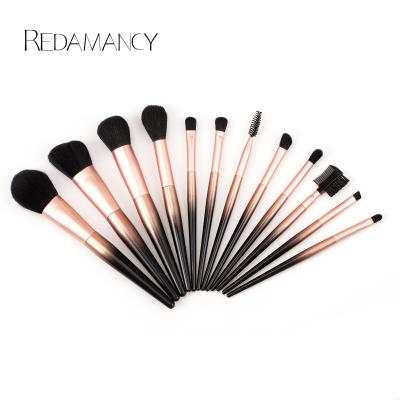 China Hot Selling Silky Soft Foundation Eyeshadow Eyeliner Makeup Brushes Gold Black Gradient Makeup Brush With Leather Case for sale