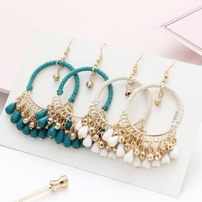 China Retro Style Factory Wholesale Price Environmentally Friendly Hot Handwoven Round Drop Tassel Earring for sale