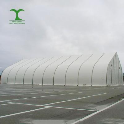 China Festival Guangzhou Factory 12x25m White PVC Coated Aluminum Frame Large Storage Herschel Outdoor Industrial Warehouse TFS Curved Tents for sale