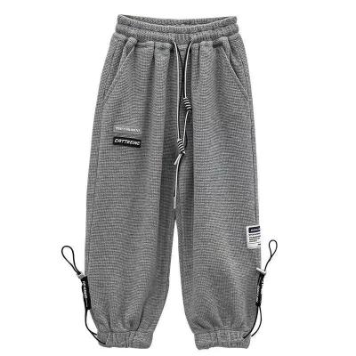 China Spring And Harun Versatile High Street Casual Breathable Autumn Feet Loose Sweatpants Boys Sweatpants for sale