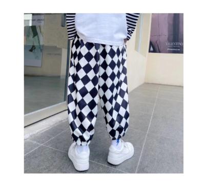 China 2022 Spring Breathable Plaid Casual Radish Pants Children's Wear Black And White Loose Pants for sale