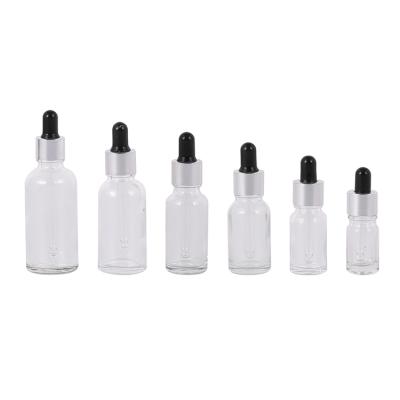 China Personal Care 10ml Clear Essential Oil Bottles Glass Dropper Transparent Bottle With Black Rubber Head for sale