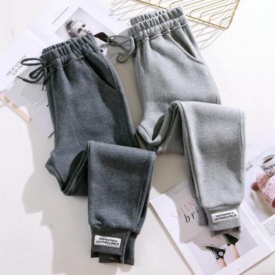 China Anti-wrinkle sports pants women's pants loose pants spring and velvet new feet casual pants fall 2021 for sale