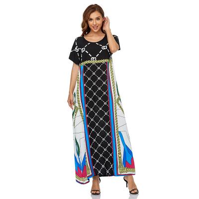 China Polyester Muslim Women's Maxi Dress Middle East Short Sleeve Long Skirt Women's Printed Dress for sale