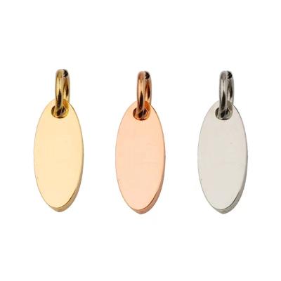 China Small CLASSIC Custom Oval Shape Stainless Steel Logo Stamping Metal Jewelry Tags Brand Snap On Metal Tags Charms For Jewelry Making for sale