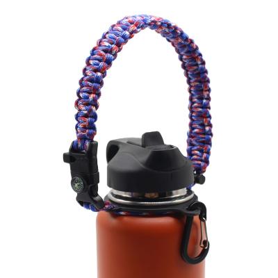 China Handmade Outdoor Paracord Handle Paracord Carrier with Compass and Fire Starter and Whistle for Bottle Handle for sale