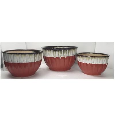 China Modern Wholesale Prices Shape Unique Ceramic Flower Pot Garden Plant Pot for sale