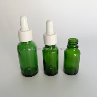 China Non Spill 15ml 20ml 30ml Empty skin care serum bottle cosmetic green glass dropper bottles for sale