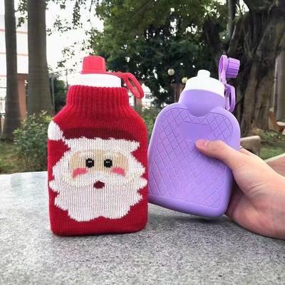 China New design fabric tan silicone 700ML collapsible hot water bag with sweater bag can drink waterk to keep warm in the winter for sale