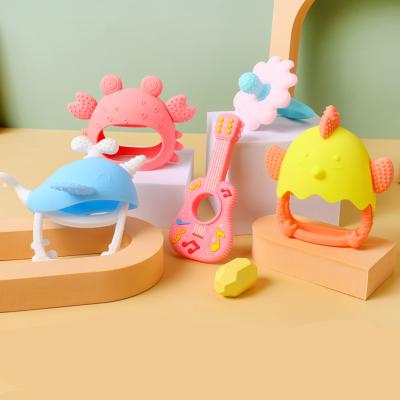 China BPA Grade Alimentar Grado Livre de silicone Rattles e Denters brinquedo para bebês Logotipo personalizado aceito à venda