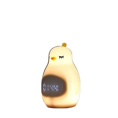 China 1- Desk Mini Sunrise Kids LED Night Light Neon Hand Digital Clock Penguin Alarm Clock for sale