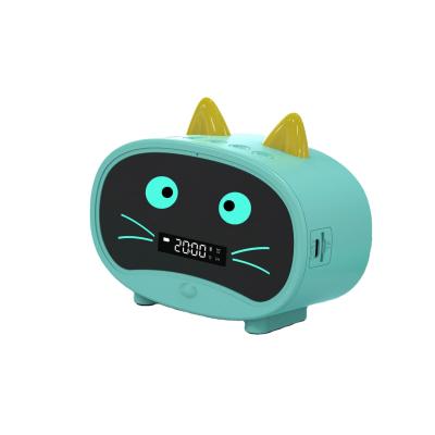 China Portable Mini Outdoor Wireless Alarm Clock Speaker Blue And Tooth Of Audio Small Children'S Gift New Cute Card Cartoon Alarm for sale