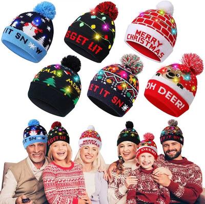 China Fashion XQL Manufacturing designer high quality custom logo gorros de invierno winter hat for women theme led christmas beanie for sale