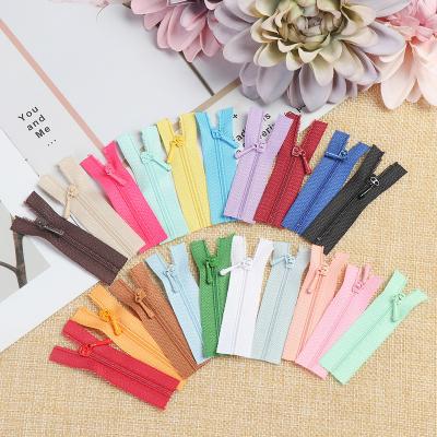 China Dawei Brand Zipper Factory Direct Sales Auto Lock Mini Zipper DIY Plastic Nylon Doll Clothes for sale