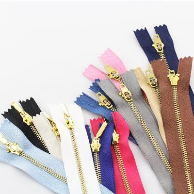 China Factory direct sale 3# metal automatic lock zipper pull fashion brass automatic metal zipper pull making machine for sale