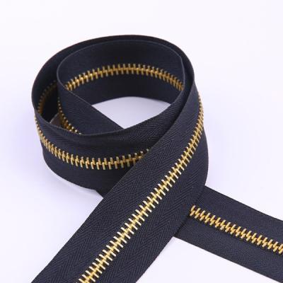 China Automatic Lock DAWEI Brand TOP GRADE No.5 Powerful Strong Teeth Brass Zipper Roll for sale