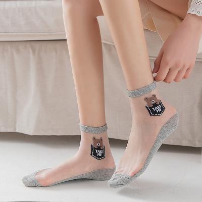 China Breathable Hot Sale Custom Embroidered Glass Socks Beautiful Ladies Stockings Shinny Net Transparent Calcetines for sale