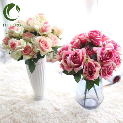 China Plastic Decorative Flower Seven Roses Flower Artificial Decoration Plastic Flower For Wedding for sale