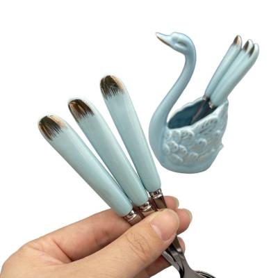 China Sustainable Travel Spoon Fork Picnic Portable Stainless Steel Ceramic Set Flatware With Swan Boxes for sale