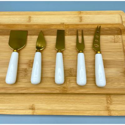 China Sustainable Empty Fork Slicer 5 Pcs Stainless Steel Butter Cutting Miniature Set Cheese Knife for sale