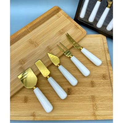 China 5 Pcs Sustainable Hot Selling Gold Stainless Heat Butter Set Pro Cheese Knife With Fork In Box for sale