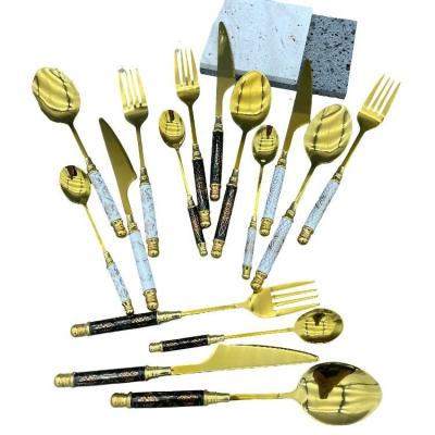 China 2022 Viable Knife Spoon Handle Luxury Ceramic Tableware Package Set Stainless Steel Fork for sale