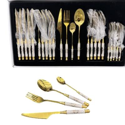 China Stainless Steel Set Handle Metal Flatware White Ceramic Sustainable Combined Tableware Cutlery Set Wholesale for sale