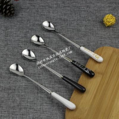 China Sustainable Wholesale Creative Ceramic Handle Kids Stainless Steel Tableware Spoon for sale