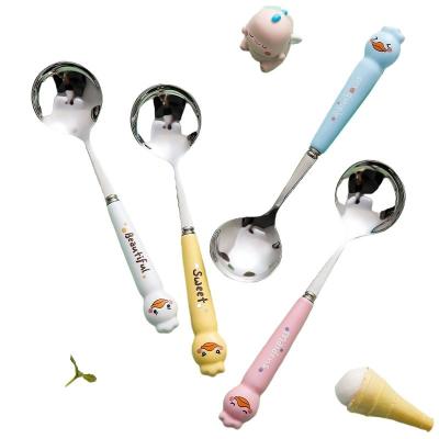 China Child Simple Ceramic Handle Cartoon Stainless Steel Cute Food Spoon Stocked Western Fork for sale