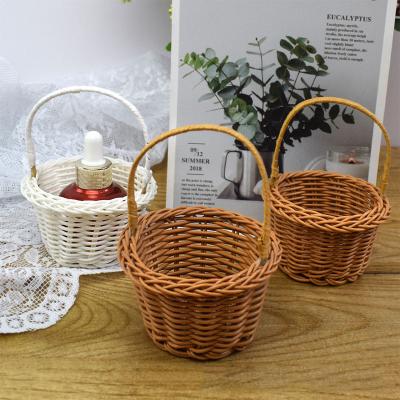 China Sustainable High Quality Natural rattan basket Portable mini flower basket Home storage basket rattan for sale