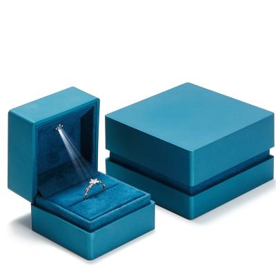 China Custom Blue Spray Paint Diamonds LED Plastic Small Empty Jewelry Boxes Packing For Ring for sale