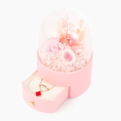 China Luxury Custom Preserved Pink Small Flower Plastic Gift Round Jewelry Packaging Box For Jewelry Storage for sale