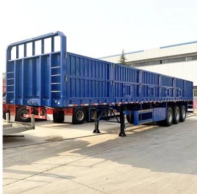 China 12.00R22.5 Tri-axle Fence Semi Truck Transport Bulk Cargo Trailer Side Dump Semi Trailer for sale