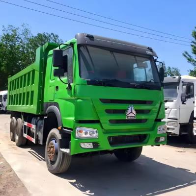 China Second-Hand HOWO 6X4 Dump Truck for Mining to Russia Manual Window and Cargo Tank 5.3-6.2M for sale