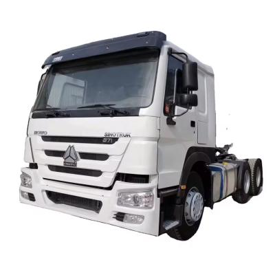 China Single Row Seat Sinotruk HOWO Heavy-Duty 6x4 Tractor Head Truck with None Touch Screen for sale