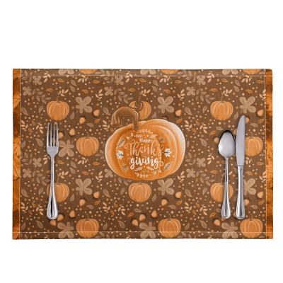 China Oilproof 2021 Bestselling Happy Thanksgiving Leaves And Pumpkins Dining Table Mat Set Customized Printed Decorative Table Mat for sale