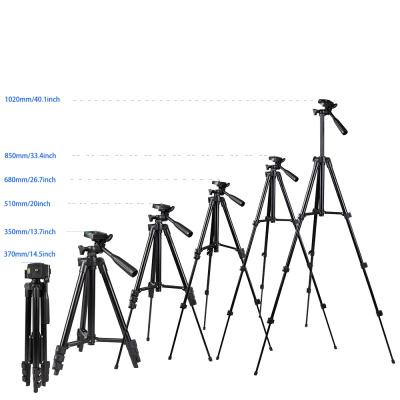 China Digital Camera Black Tripod Mobile Phone Camera Tripod Photography Vibrato Mobile Phone Selfie Holder for sale