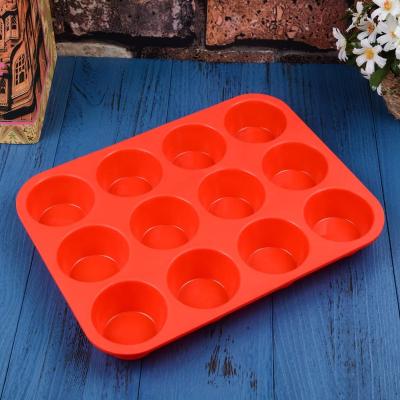 China Stocked 12 Cup Silicone Bread Pan Nonstick BPA Free Cupcake Pan 1 Pack Normal Size Silicone Mold for sale