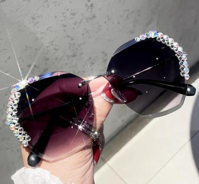 China Frameless Rhinestone Diamonds Sun Glass Women Sunglasses Women Polarized Bling Sunglasses 2021 Women Men for sale