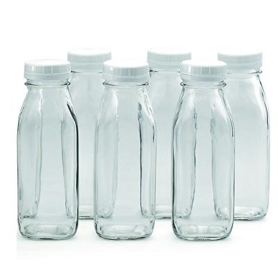 China Eco - Friendly Recyclable 500ml Milk Bottle With Tamper Proof Transparent Glass Cap Drink Bottle Factory for sale