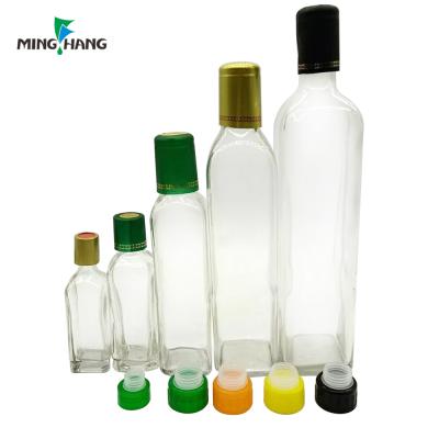 China Recyclable empty vinegar glass with spray pourer lid olive oil bottle wholesale vid bottle for olive oil for sale