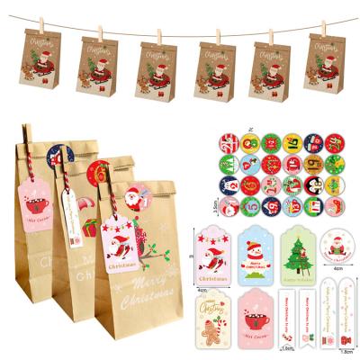 China 24 Pcs Recyclable Christmas Kraft Paper Candy Food Paper Bags Gift Packaging Bags with Clips Tags for Christmas Party Classrooms Decorations for sale