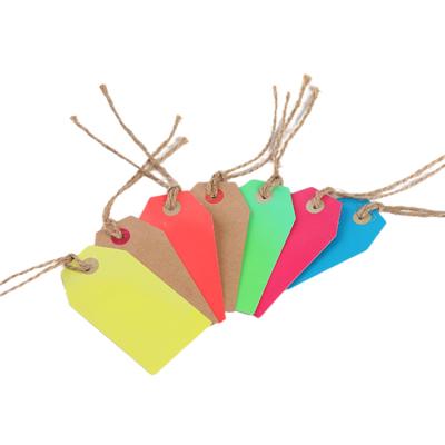 China Sustainable Custom Printing Luxury Cardboard Clothing Paper Swing Hang Tags With String Wedding Garment Tags for sale