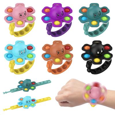 China Plastic Finger Wrist Toys Happy Spinning Toy Octopus Spins Squeeze Around Toy for sale