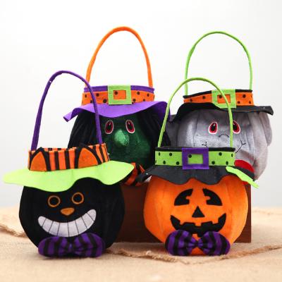 China New Halloween Cloth Art Halloween Round Bag Decoration Hat Children's Candy Wrapping Gift Bag Pumpkin Bag for sale