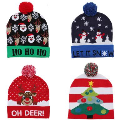 China 2020 Wool Stocking Lit Santa Christmas Hats Knitted Cute Hats With Led Kids Christmas Hat Caps for sale